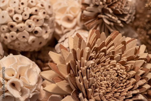 Closeup of wooden flowers and balls