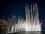 Dancing fountain with lighting in the city at night.