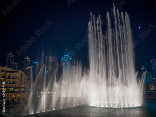 Dancing fountain with lighting in the city at night.
