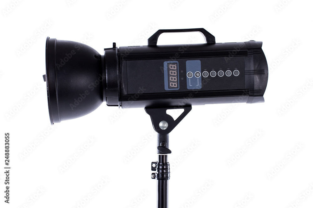 Head of studio flash strobe lamp light. Side view professional studio photography lighting close up. Isolated on white background.