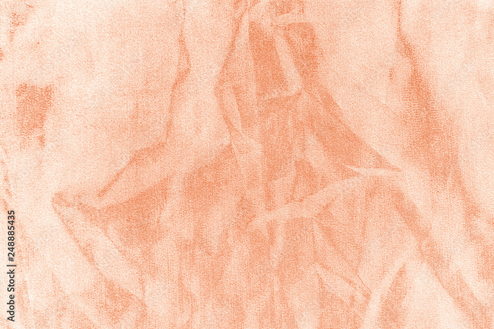 Fototapeta premium Elegant orange textile background. Silk cloth texture. Fabric pattern.