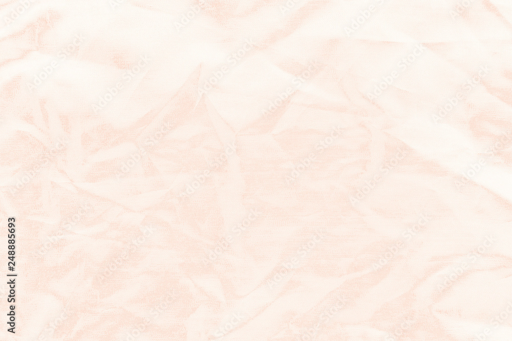 Fototapeta premium Elegant orange textile background. Silk cloth texture. Fabric pattern.