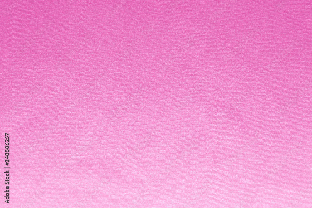 Fototapeta premium Elegant pink textile background. Silk cloth texture. Fabric pattern.