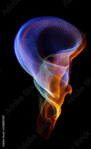 Multicolored twisted ordered parallel lines on a black background