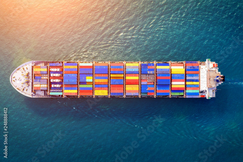 Aerial view of container cargo ship in sea. © tawatchai1990