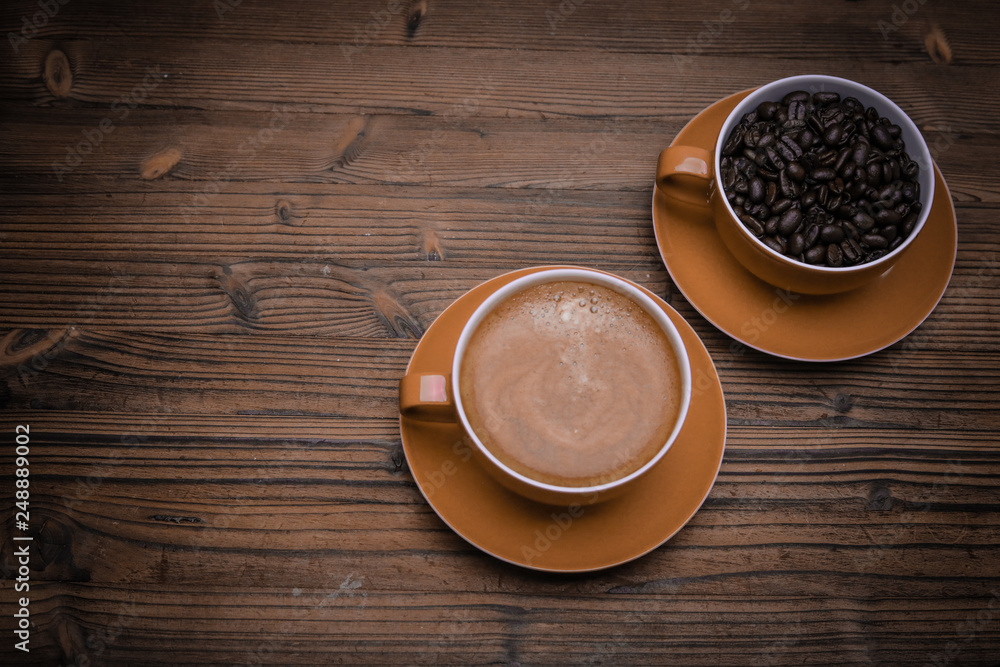 coffee beans on wood background coffee beans on wood background