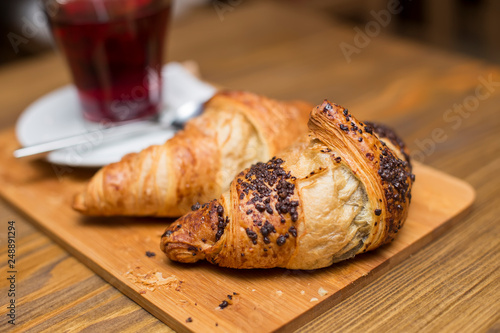 Cup of tea and croissants
