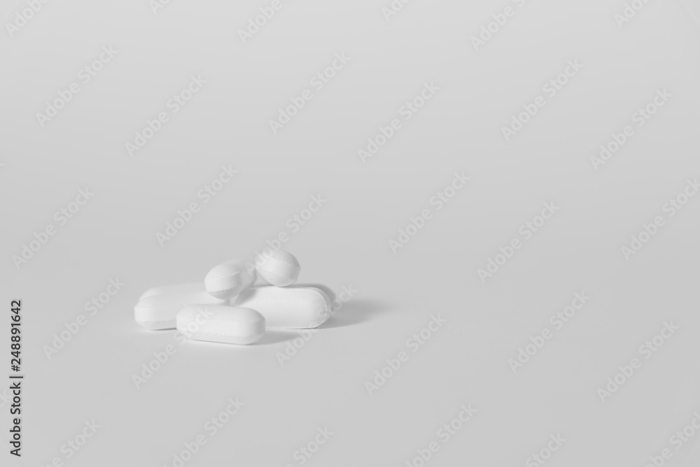 Pills on plain background Pills on plain background