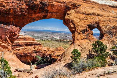 Two Massive Holes in a Ridge of Sandstone in Arches National Park of Utah
