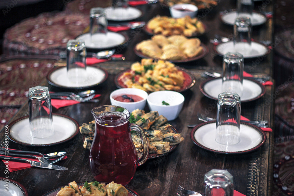 Red lemonade in a jug a middle eastern served table