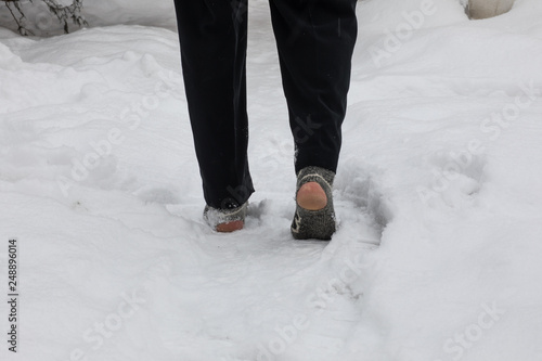 Wallpaper Mural feet in socks in the snow Torontodigital.ca