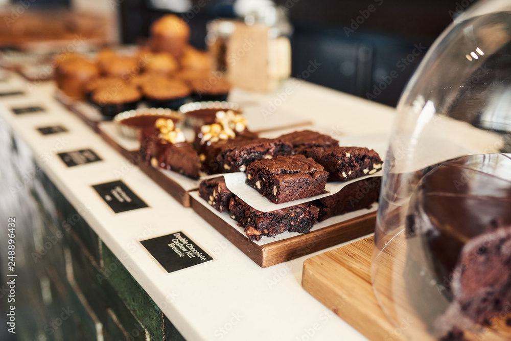 Assortment of delicious desserts on a bakery's disply counter