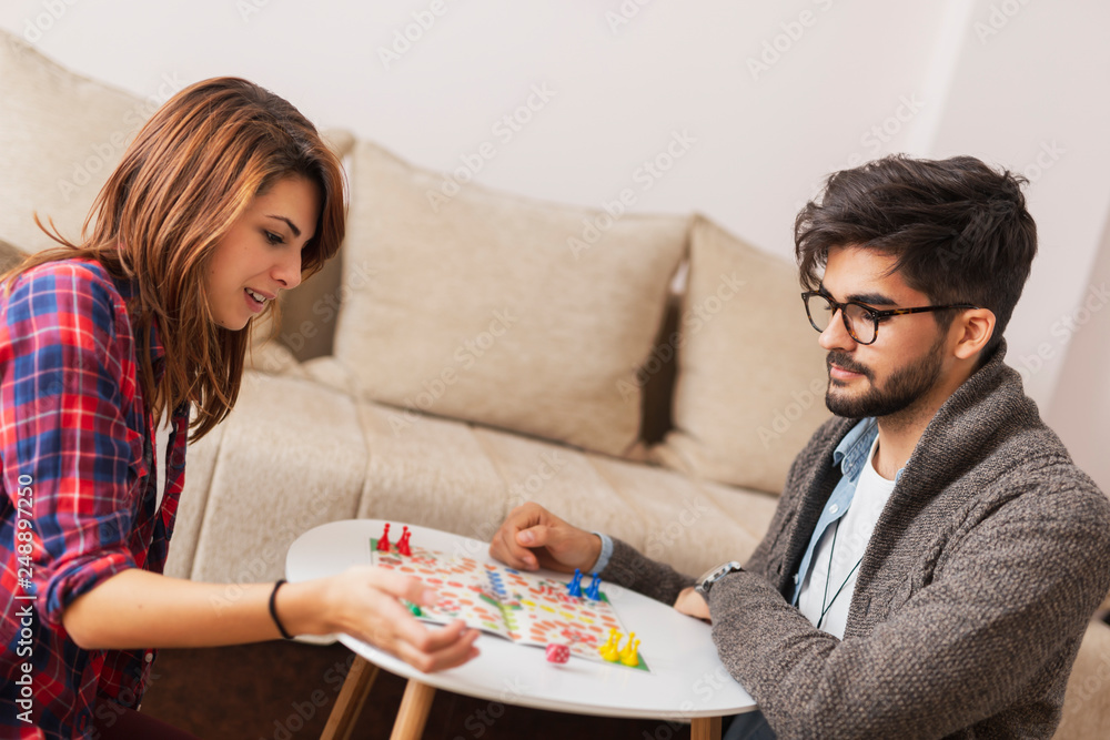 Fototapeta premium Couple playing board games