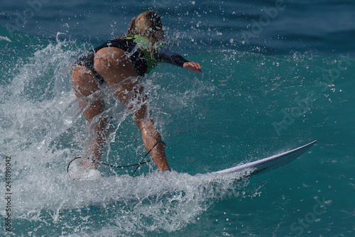 Photography Sports woman surfing wave on surfboard in ocean