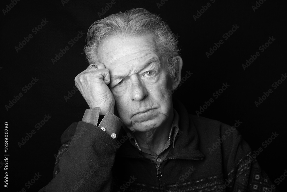 Portrait of an old man with facial expression Portrait of an old man with facial expression