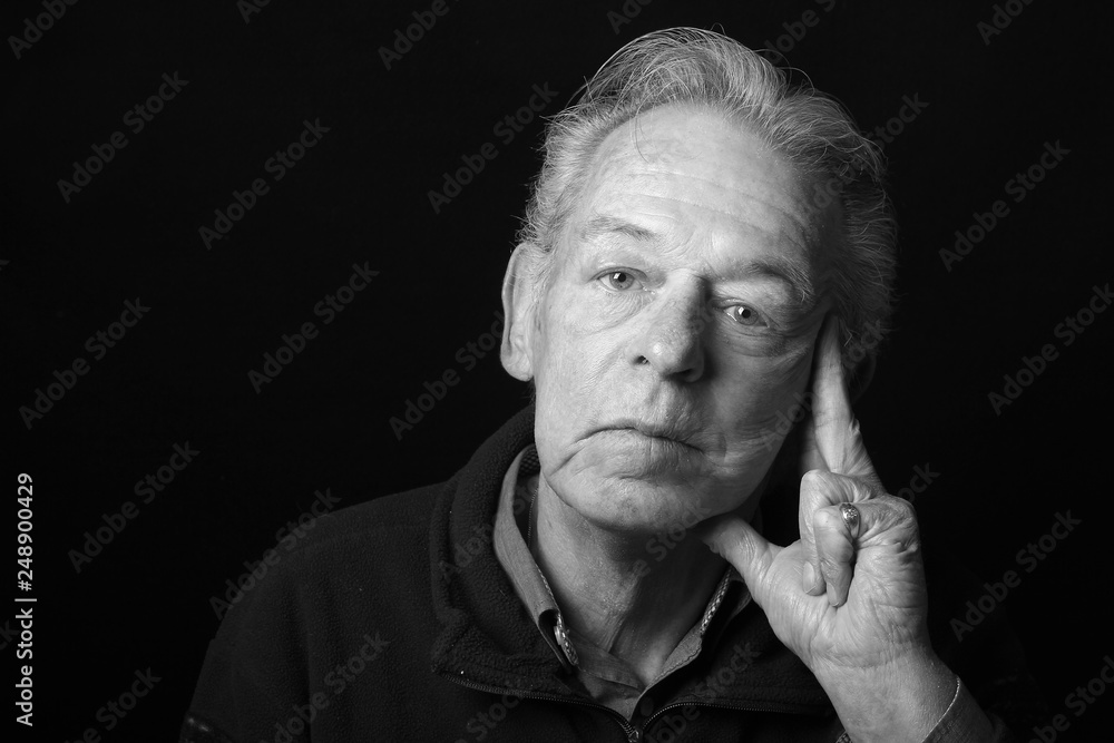 Portrait of an old man with facial expression Portrait of an old man with facial expression