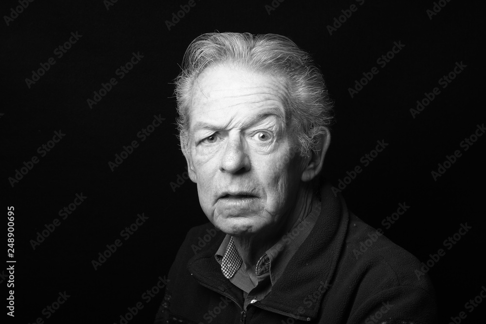 Fototapeta premium Portrait of an old man with facial expression