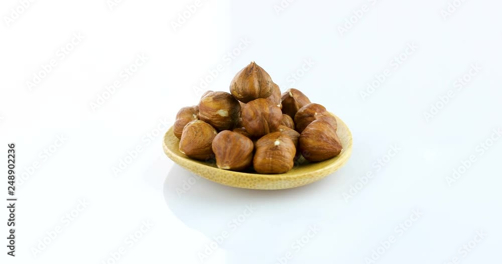 raw hazelnuts isolated on white background raw hazelnuts isolated on white background