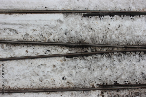 snow-covered railway tracks. winter outside. swept arrows needed cleaning. traffic jams, the subway can't get through.