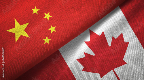 China and Canada two flags textile cloth, fabric texture photo