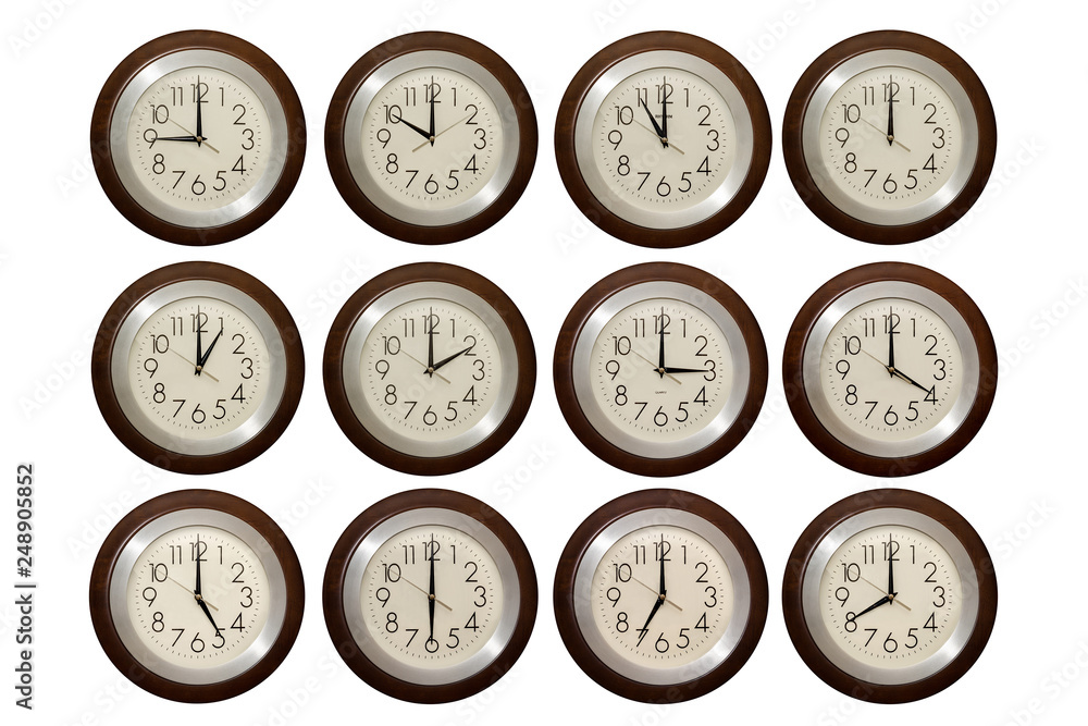 Wall clock isolated on the white background. Multiple clocks showing different time. Wall clock isolated on the white background. Multiple clocks showing different time.