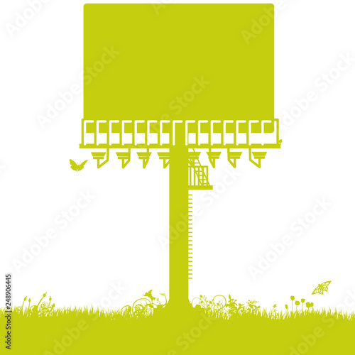 Eine hohe Plakatwand im Gras