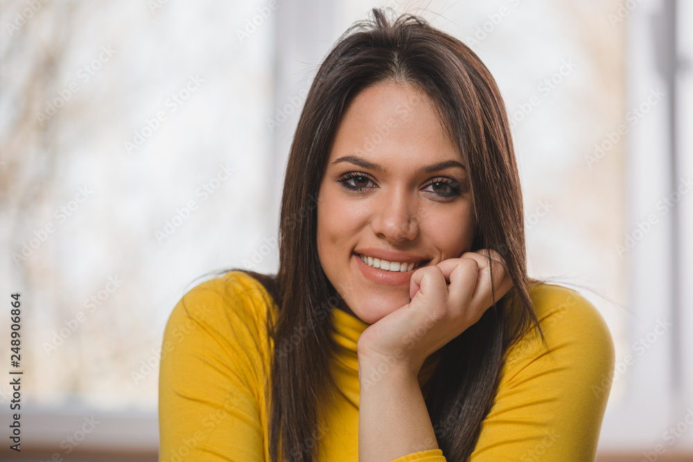 portrait of beautiful woman looking at camera and smiling portrait of beautiful woman looking at camera and smiling