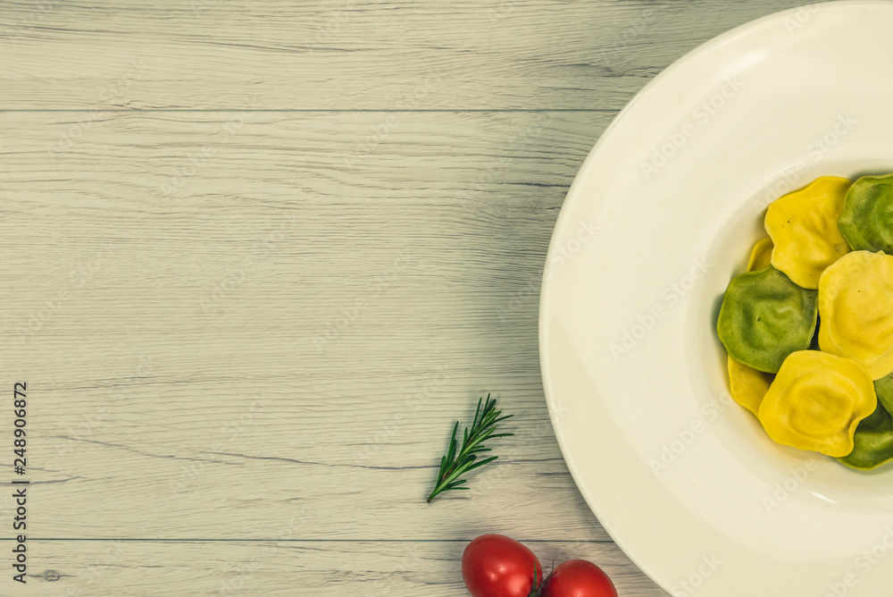 Cassic ravioli filled with basilico and cheese in a plate. Cassic ravioli filled with basilico and cheese in a plate.