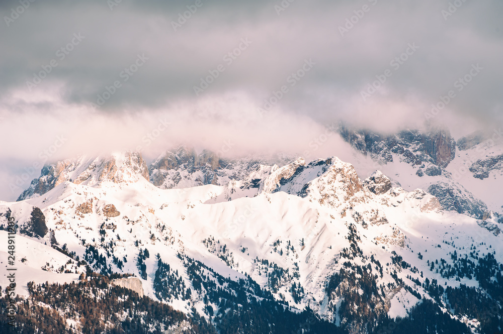Snow-covered winter Dolomite Alps at sunset, Italy
