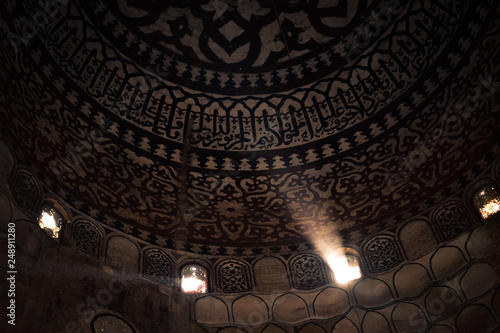 Decorating, engraving and drawing on the roofs of ancient mosques in Egypt
