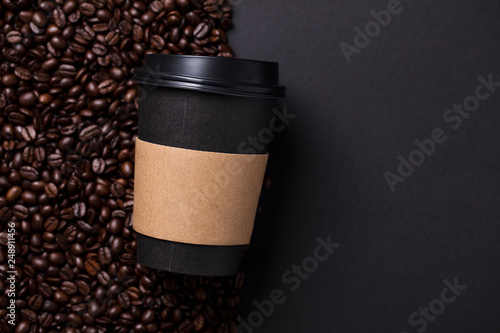 Принти на полотні Take away black coffee cup with roasted coffee beans