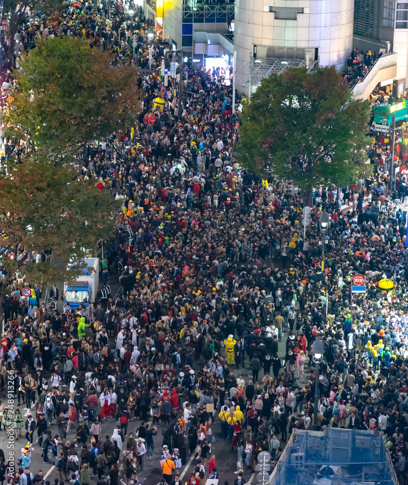 Unbelievable crowd of people in shibuya district during halloween