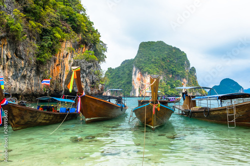 Boats in Thai style on the background of rocks in Krabi province © terezika