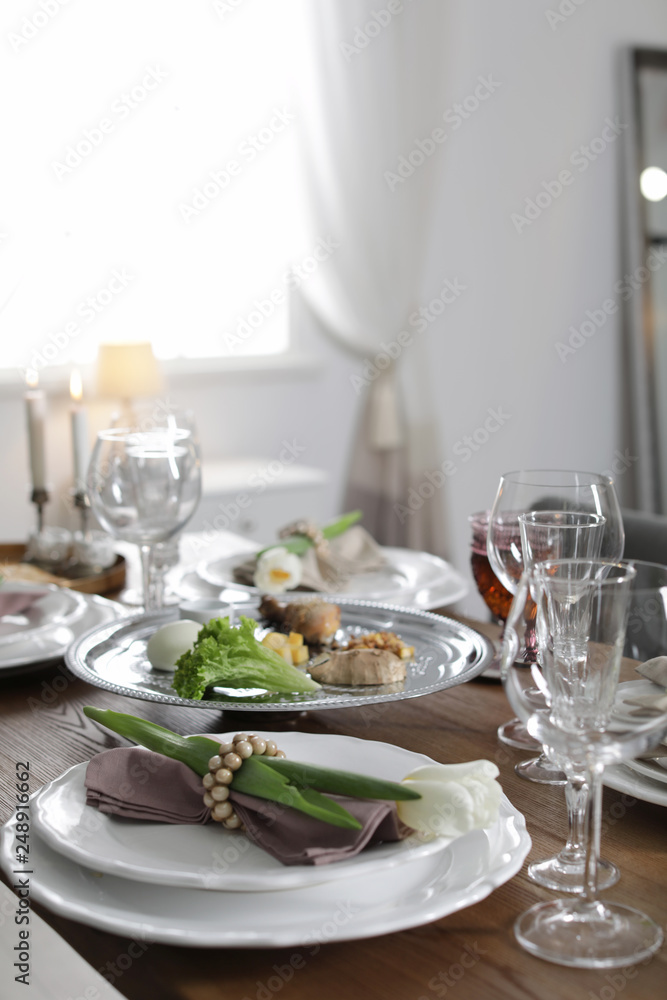 Festive Passover table setting at home. Pesach celebration