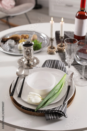 Festive Passover table setting at home. Pesach celebration