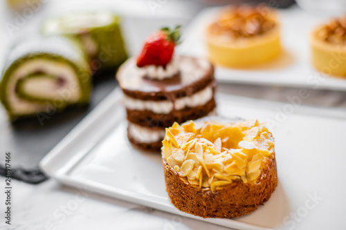 Wallpaper Mural delicious strawberry and mint cakes on a white and black plate Torontodigital.ca