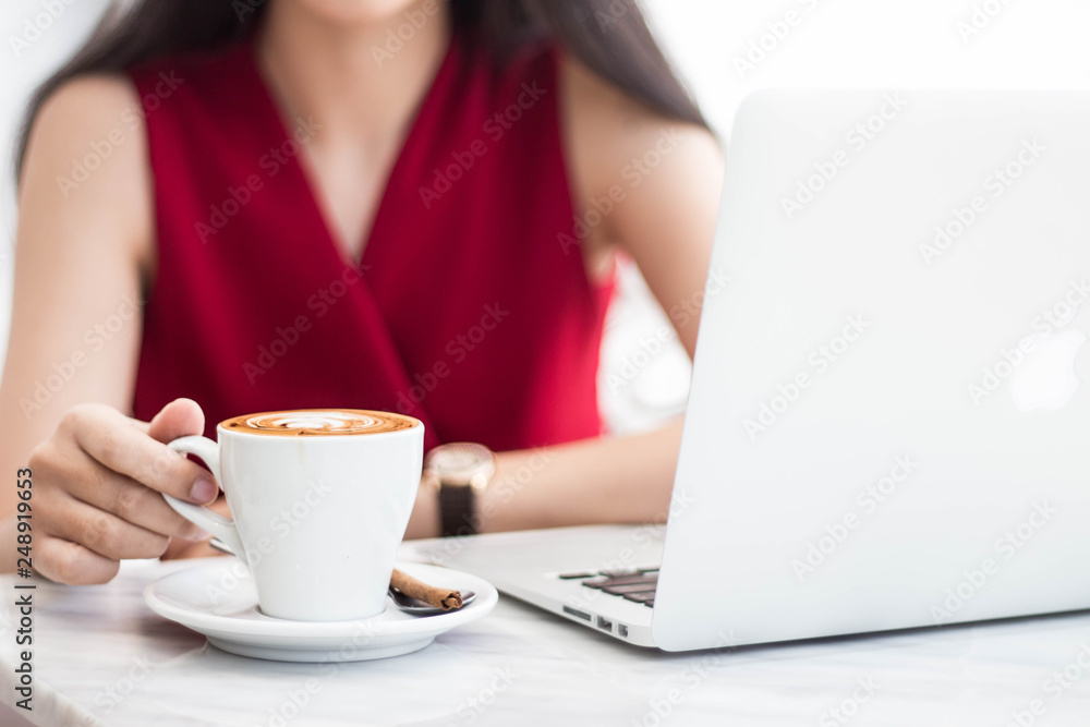 woman with cup of coffee and laptop. - image woman with cup of coffee and laptop. - image