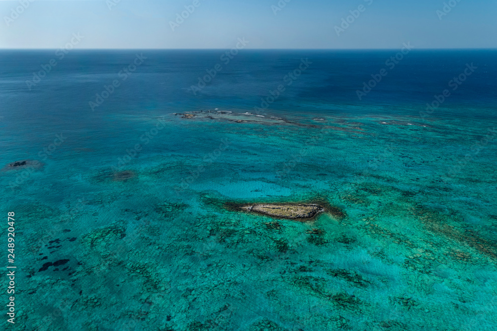 Obraz premium Greece island by drone. Turquoise sea and lagoon. Sunny day on Crete.