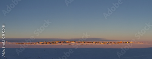 Panoramic view of Cambridge Bay, Nunavut, a northern arctic community, in late winter