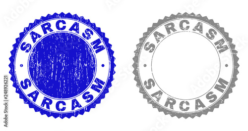 Grunge SARCASM stamp seals isolated on a white background. Rosette seals with distress texture in blue and grey colors. Vector rubber stamp imitation of SARCASM tag inside round rosette.