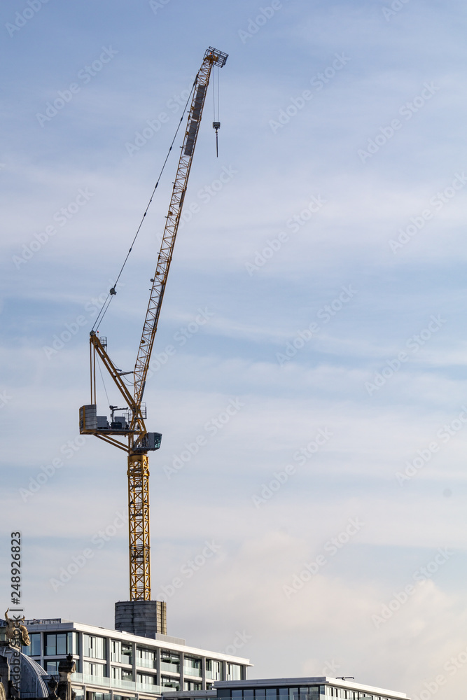 Crane on background of blue sky Crane on background of blue sky