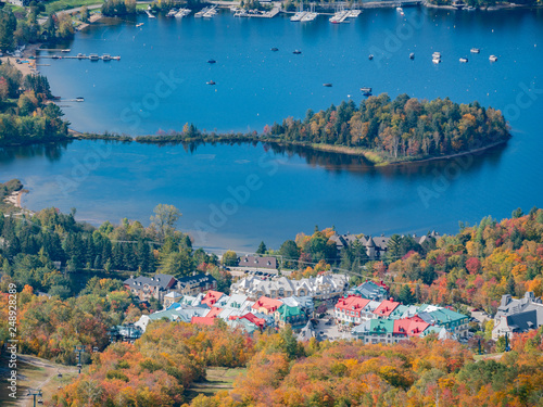 Fototapeta Naklejka Na Ścianę i Meble -  Aerial view of Mont-Tremblant National Park with Lake Tremblant in fall color