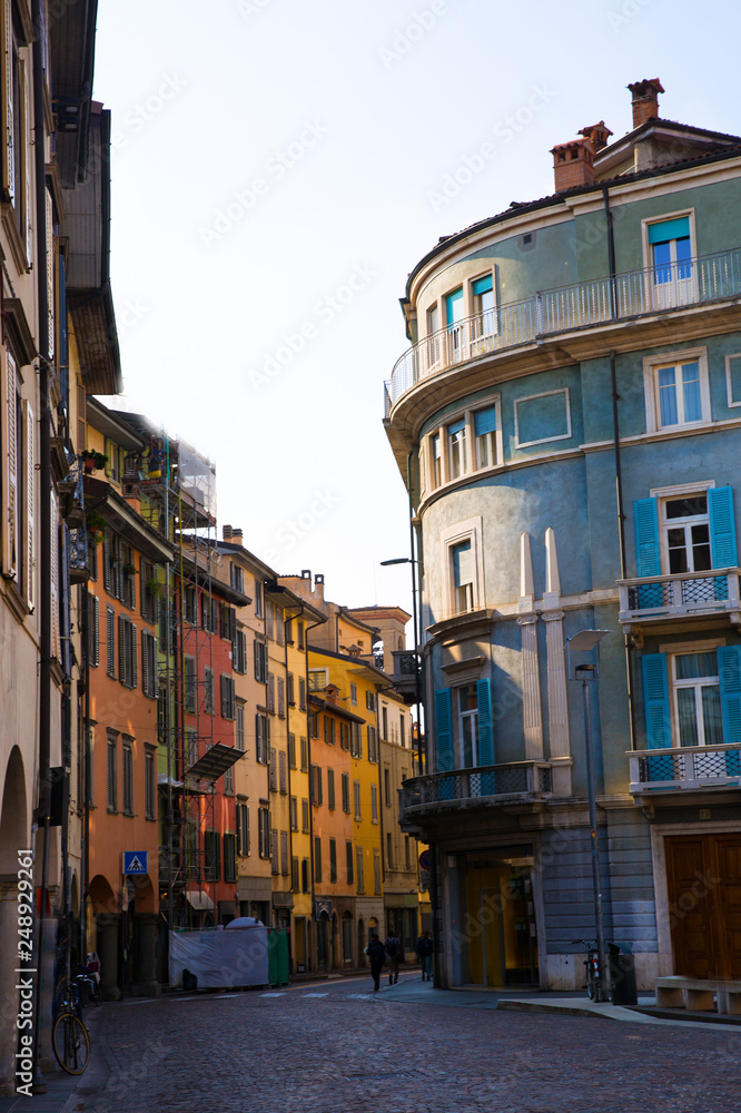 Street with colorful buildings in Bergamo.