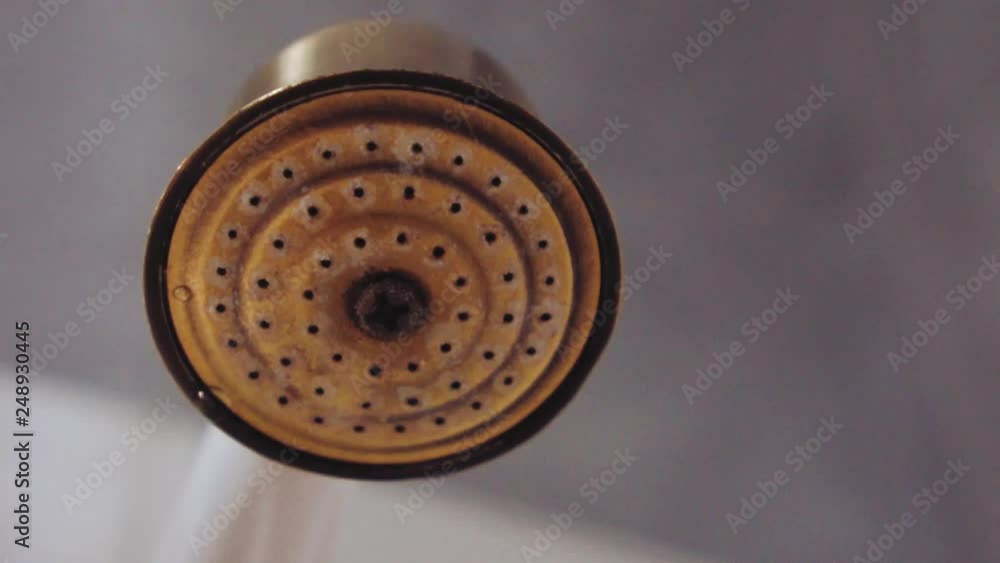 Water Flows From The Shower, Close-Up.Shower Head, Water Flowing, Steam Rising, Shower Water Flows From The Shower, Close-Up.Shower Head, Water Flowing, Steam Rising, Shower