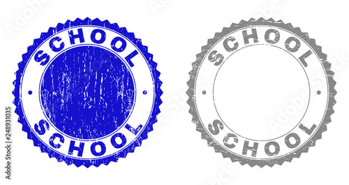 Grunge SCHOOL stamp seals isolated on a white background. Rosette seals with grunge texture in blue and grey colors. Vector rubber stamp imitation of SCHOOL text inside round rosette.