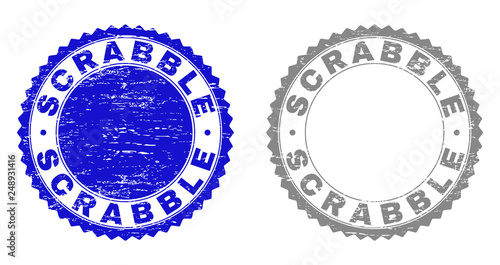 Grunge SCRABBLE stamp seals isolated on a white background. Rosette seals with grunge texture in blue and grey colors. Vector rubber stamp imitation of SCRABBLE caption inside round rosette.