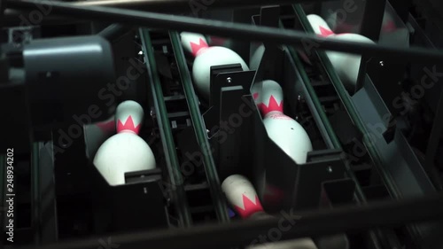 bowling machine behind