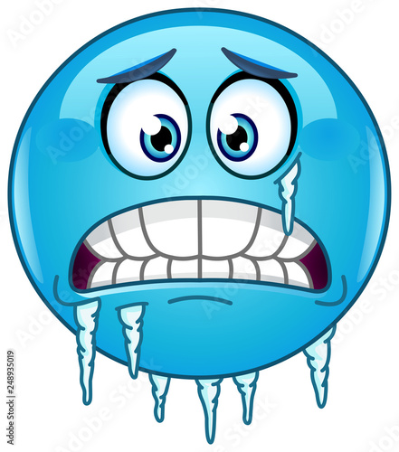 Blue cold freezing face emoticon with icicles clinging to its jaw and cheek photo