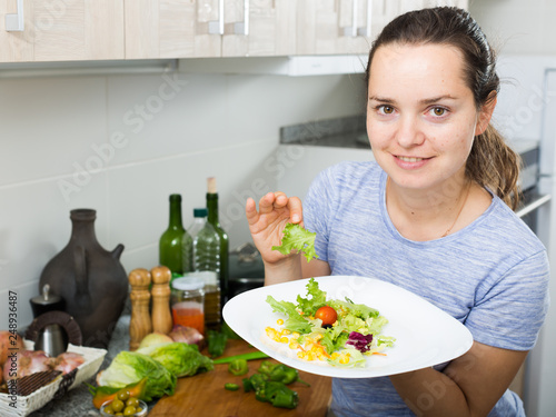 woman cooking salad