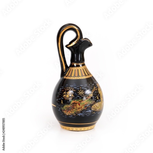 A copy of an ancient Greek black vessel for wine isolated on white background